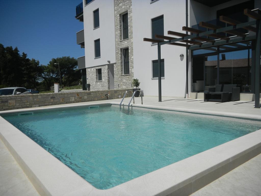 Modernes Apartment mit Swimmingpool und großem Garten in Medulin