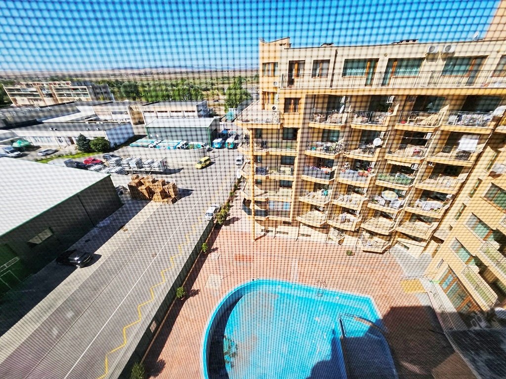 1-bedroom apartment with mountain view, pool, and terrace in Amadeus 5