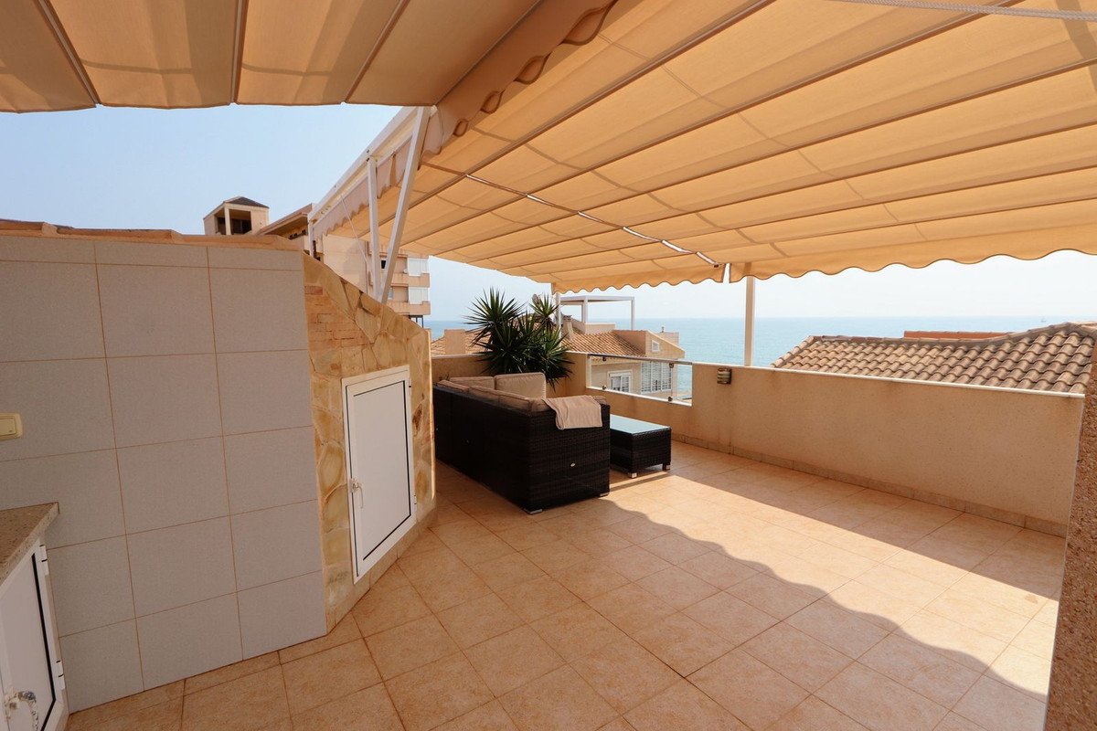 Außergewöhnliches Doppelhaus mit Meerblick und direktem Strandzugang, Torrevieja