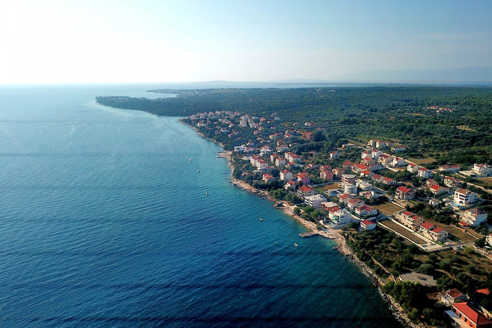 Attraktives Grundstück (750 m²) mit Meerblick, 50 m vom Strand entfernt, Kožino, Kroatien