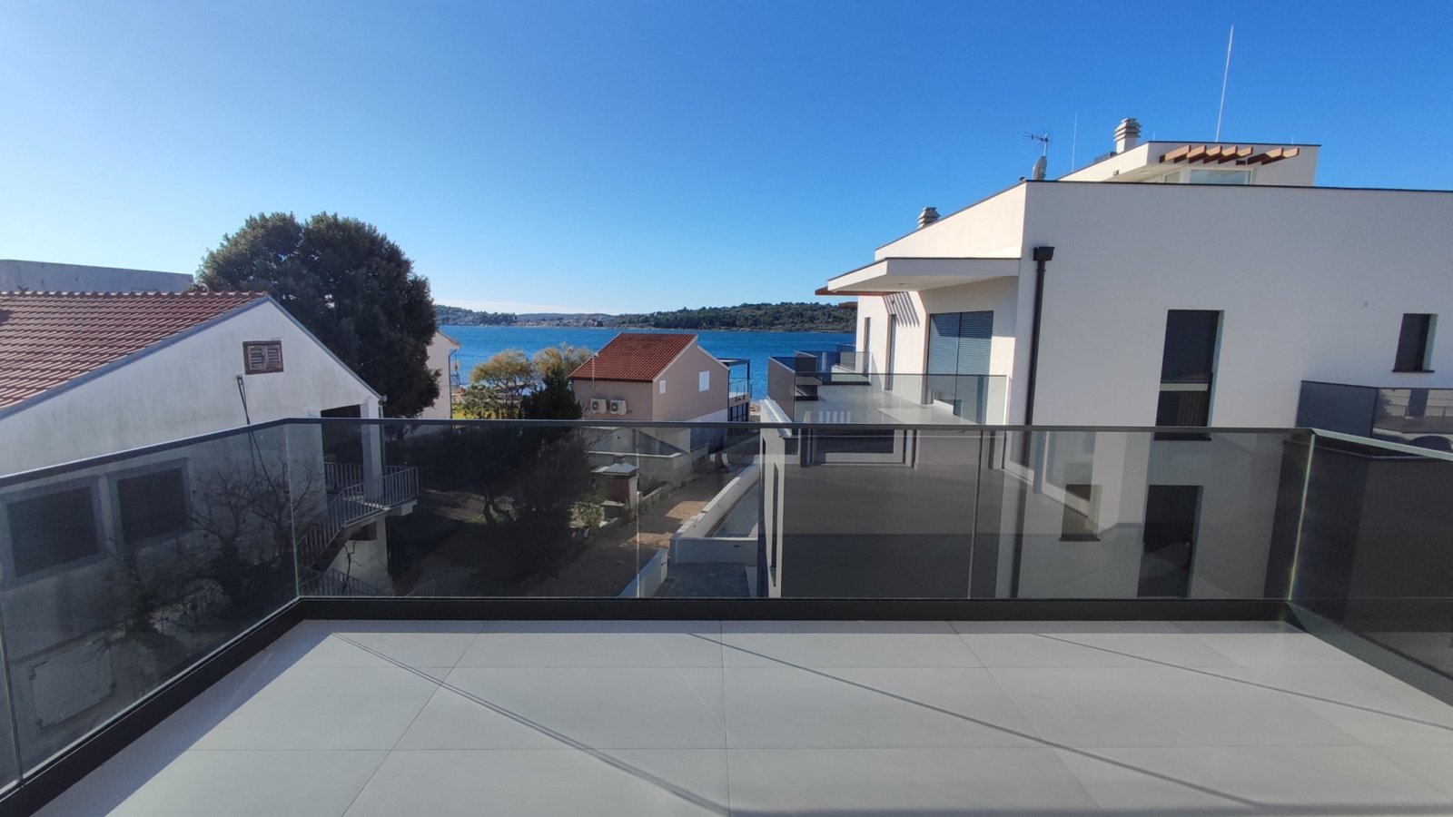 Luxury duplex apartment with roof terrace just 100 m from the sea in Vodice, Srima