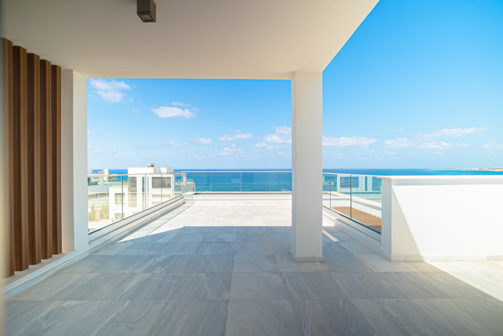 Modern villa by the sea with a roof terrace, 4 bedrooms and private grounds