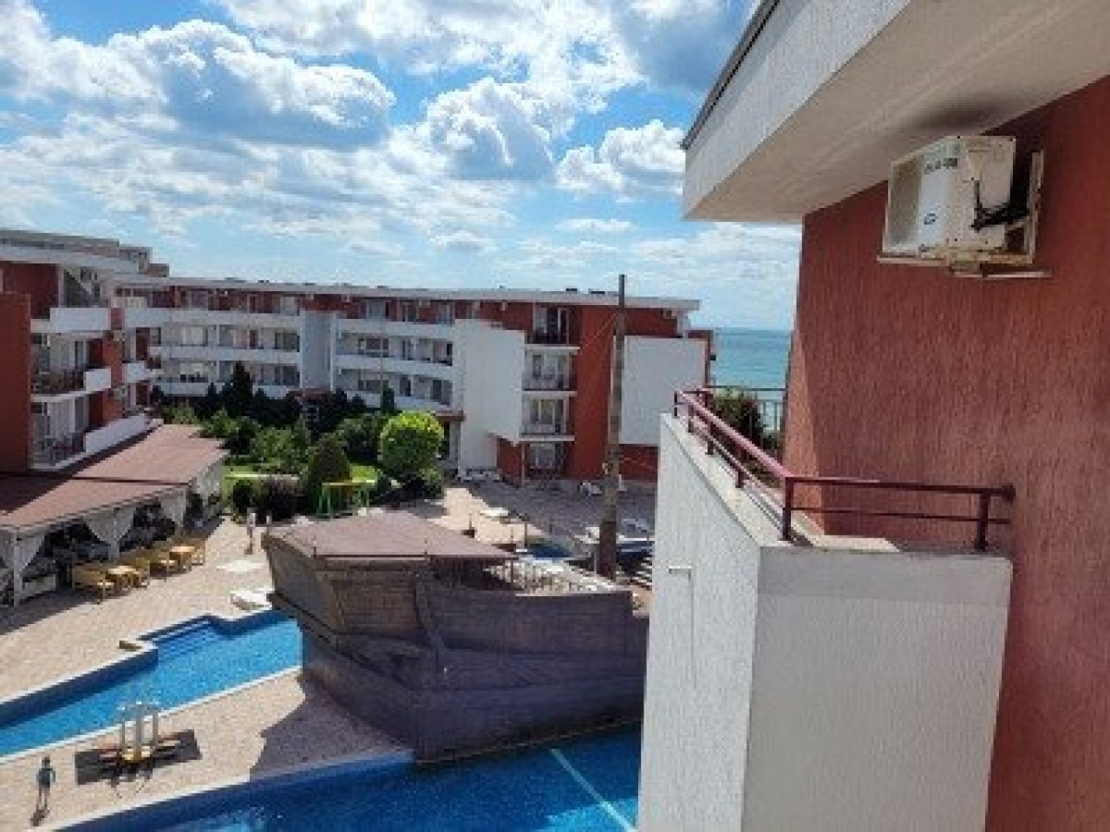 Three-room apartment with three glazed terraces and a private rose garden in Sveti Vlas, Bulgaria.