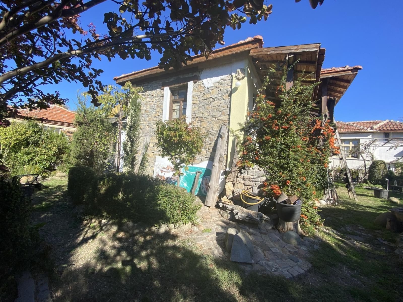 Two houses in a yard in the picturesque village of Lozarevo, Sungurlare municipality.