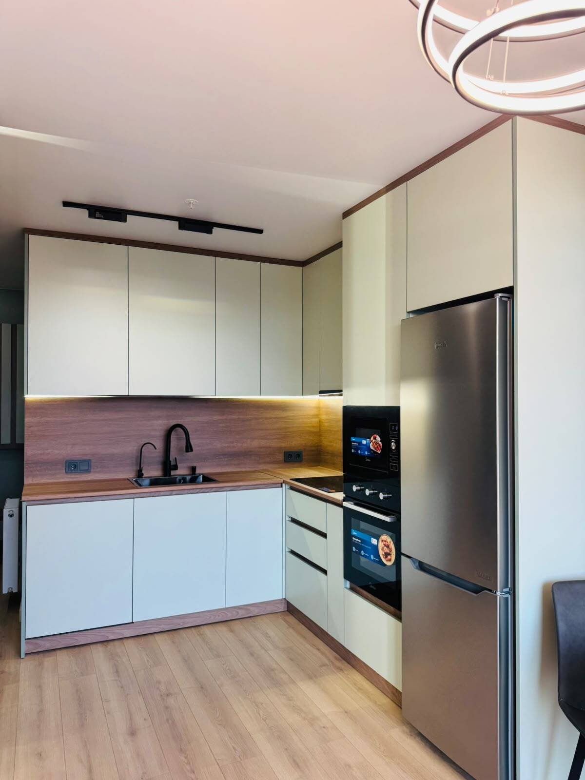 Recently renovated 2-bedroom apartment in Batumi, Georgia – high floor, view of the rugby stadium, and spacious balcony.