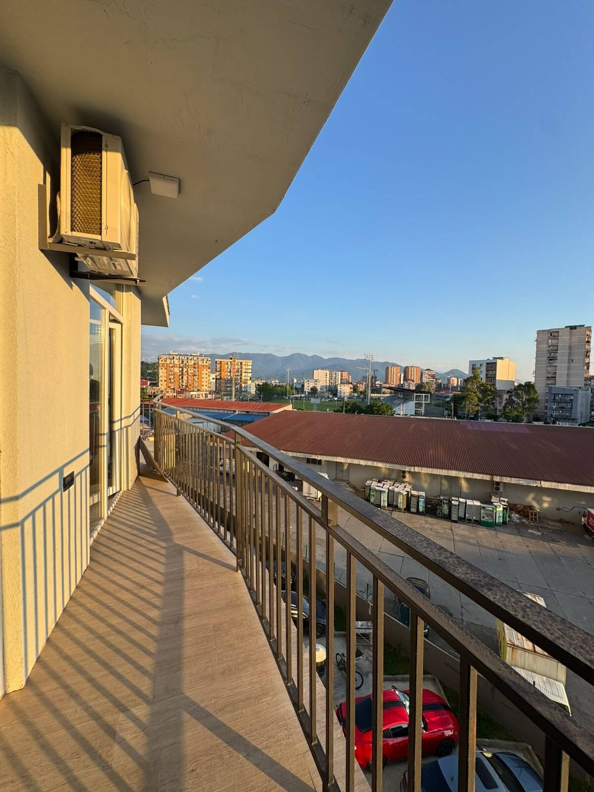 Recently renovated 2-bedroom apartment in Batumi, Georgia – high floor, view of the rugby stadium, and spacious balcony.