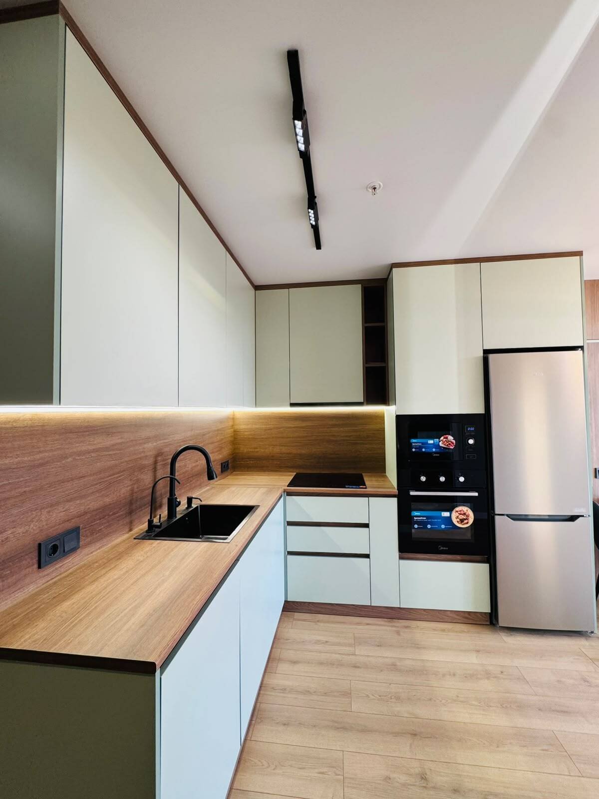 Recently renovated 2-bedroom apartment in Batumi, Georgia – high floor, view of the rugby stadium, and spacious balcony.