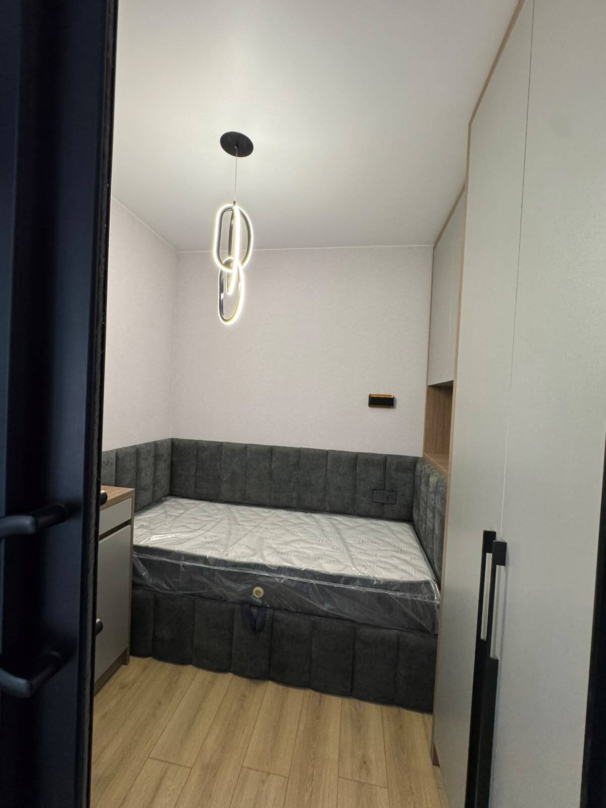 Recently renovated 2-bedroom apartment in Batumi, Georgia – high floor, view of the rugby stadium, and spacious balcony.