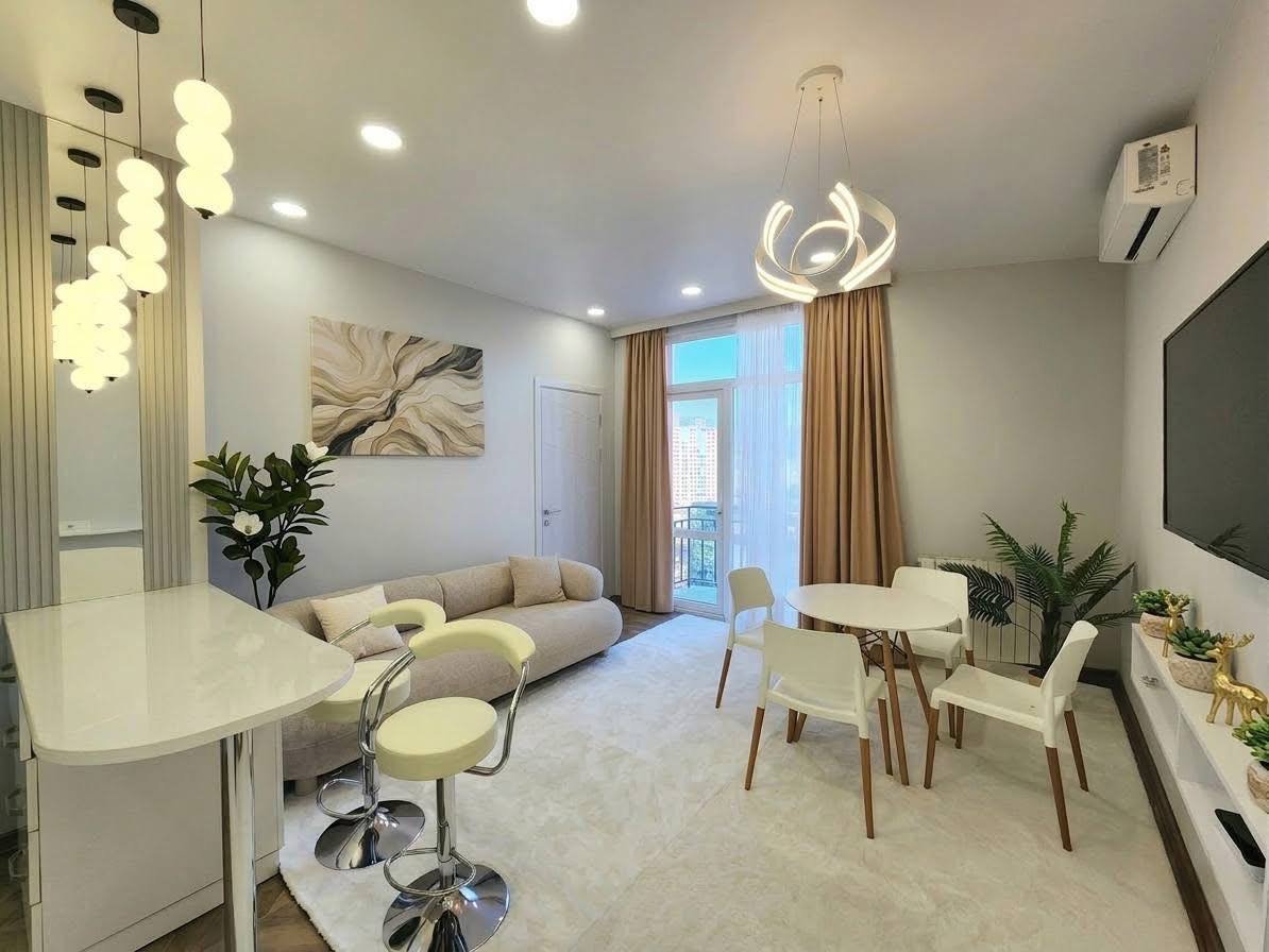 Designer-renovated 2-room apartment with mountain view in Batumi, Georgia – fully furnished residence on a high floor