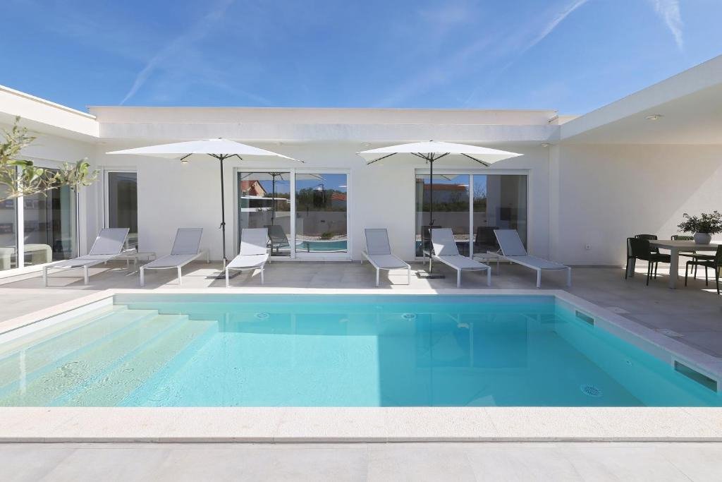 Elegant barrier-free villa with heated pool and summer kitchen, Privlaka, Croatia