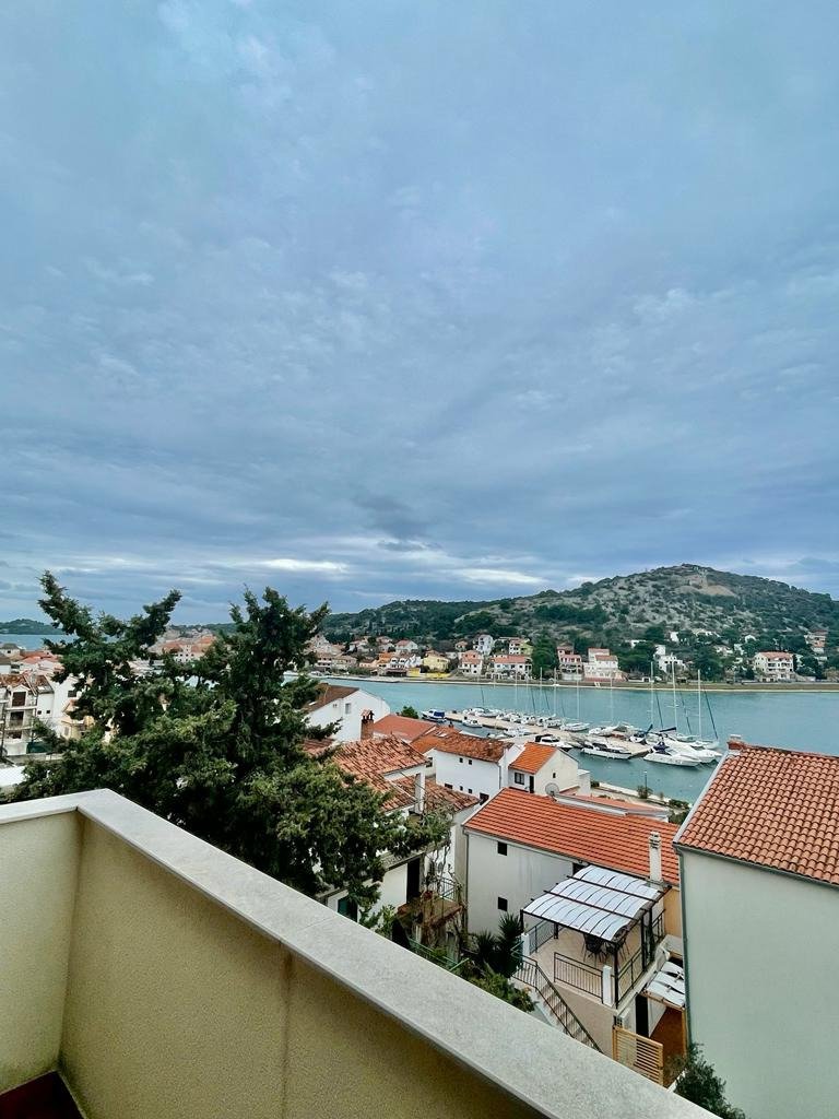 Investment apartment house 70 m from the sea with a view Tisno