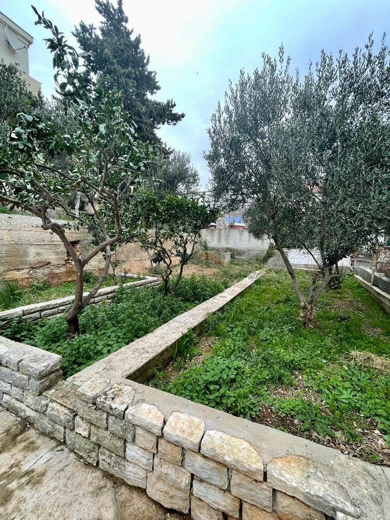 Investment apartment house 70 m from the sea with a view Tisno