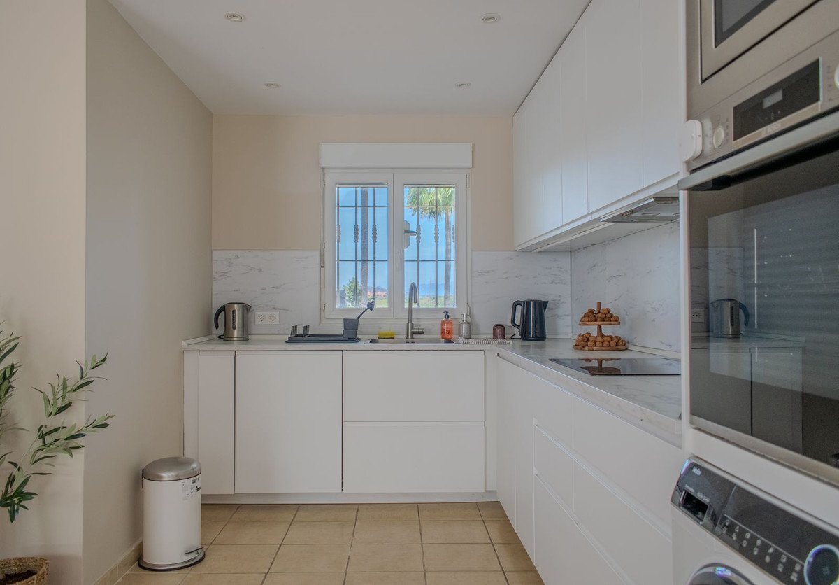 Investment renovated apartment with tourist license and two terraces by the golf course, Estepona, Spain