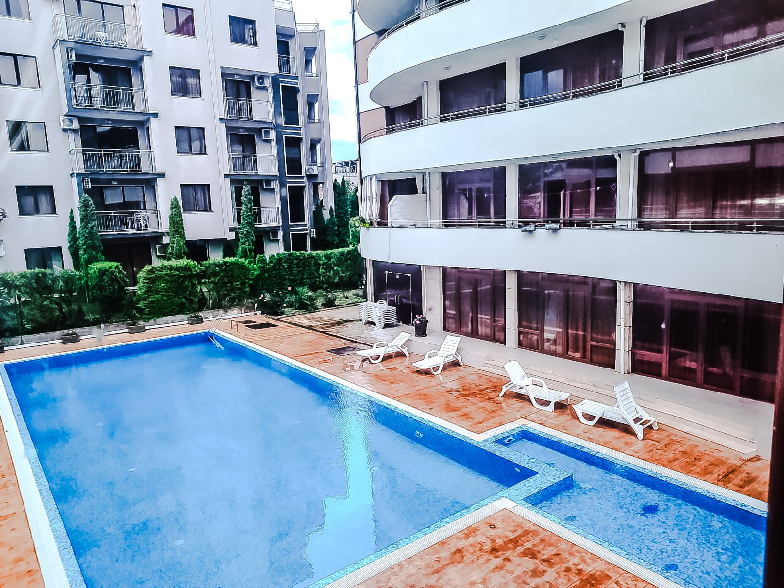 Three-room apartment in the Eden complex at Sunny Beach with a view of the pool