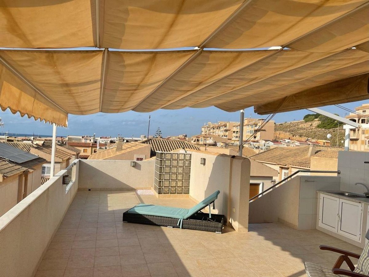 Außergewöhnliches Doppelhaus mit Meerblick und direktem Strandzugang, Torrevieja